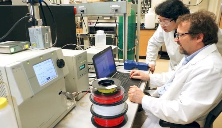  Researchers investigating 3D printer particle emissions [Source: Vimeo] 