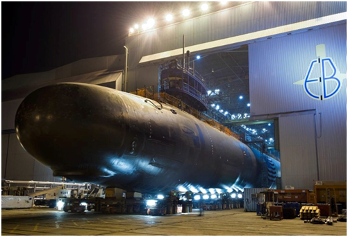 The Virginia-class attack submarine Pre-Commissioning Unit (PCU) North Dakota (SSN 784) is rolled out of an indoor shipyard facility at General Dynamics Electric Boat in Groton, Conn., Sept 11, 2013. [Source:  U.S. Navy ]