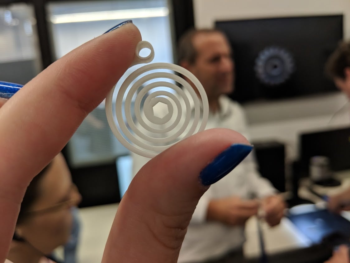  XJet CBO Dror Danai as seen through a 3D printed ceramic part at the new Additive Manufacturing Center in Rehovot Science Park, Israel 