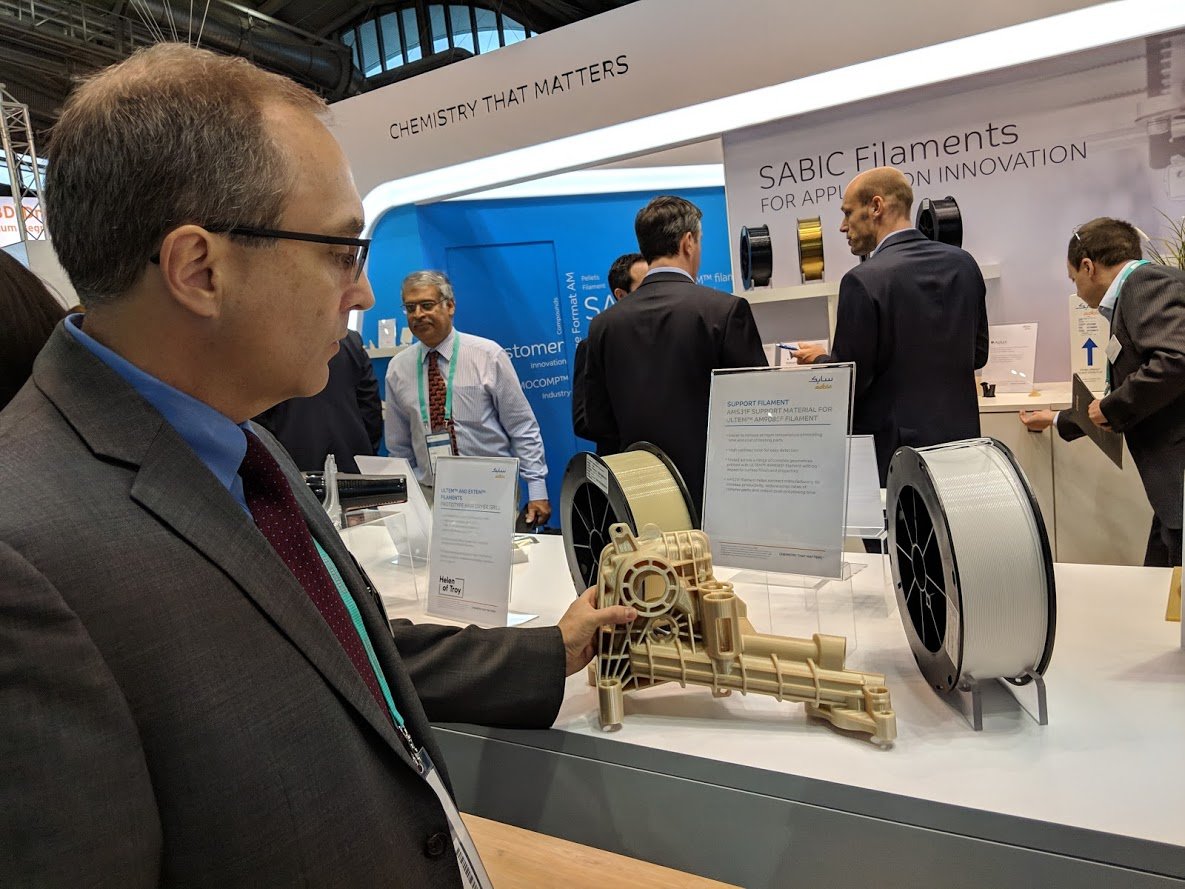  Keith Cox, Senior Business Manager, Additive Manufacturing, SABIC looks at a part 3D printed in ULTEM and made using the new breakaway support material at formnext 2018 [Image: Fabbaloo] 