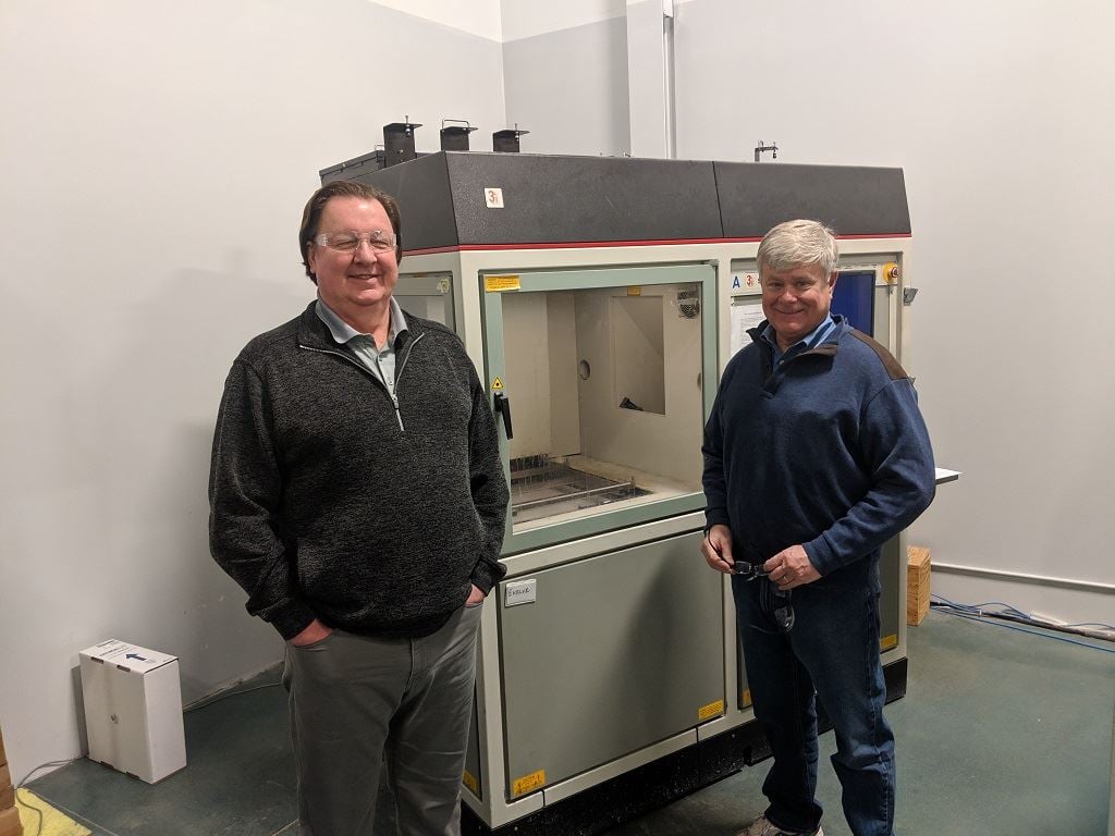  Mark and Chip with The Technology House’s first SLA 3D printer [Image: Sarah Goehrke] 