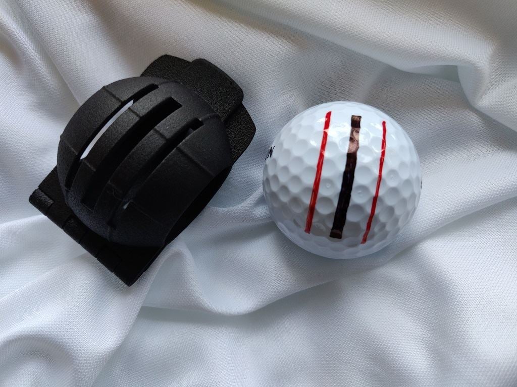  The 3D printed Mohawk and a vernier acuity line-marked golf ball [Image: CDJ Designs] 