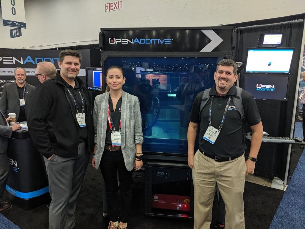  L-R: Ty Pollak, Olga Ivanova, and Chris Taylor of OpenAdditive with the Panda system [Image: Fabbaloo] 