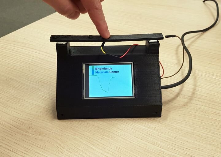 Small-scale bridge 3D print to test self-sensing using continuous carbon fiber [Source: Anisoprint]