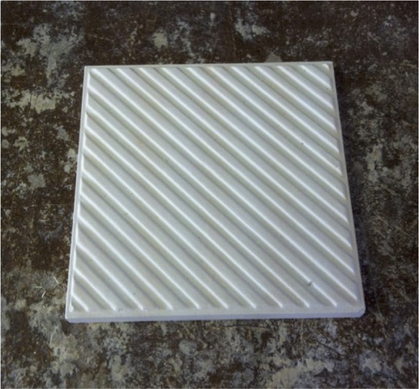  A ceramic plaster positive mold of the tile 