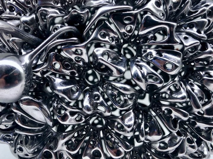  Detail of a complex 3D printed titanium Clutch Bag [Source: Fabbaloo] 