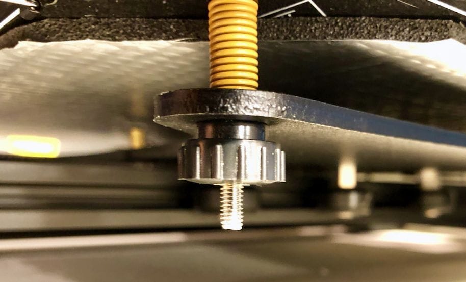  Thumbscrews under the print plate of the CR-10S desktop 3D printer make for easier leveling 