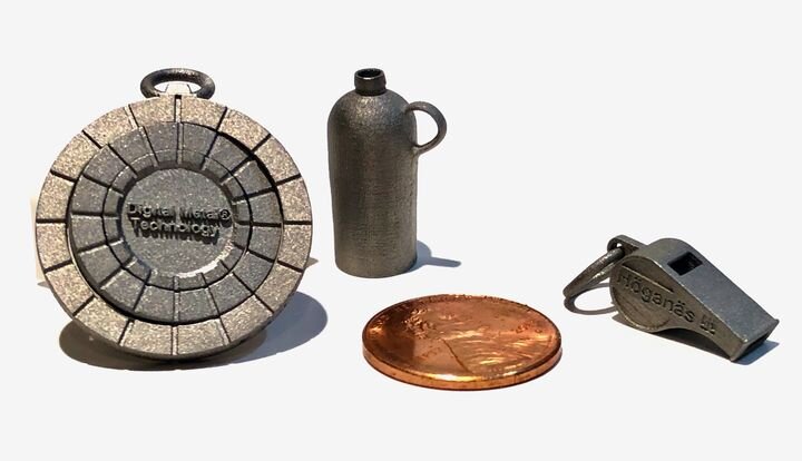 A selection of tiny, fine-detailed metal 3D prints produced by Digital Metal [Source: Fabbaloo]