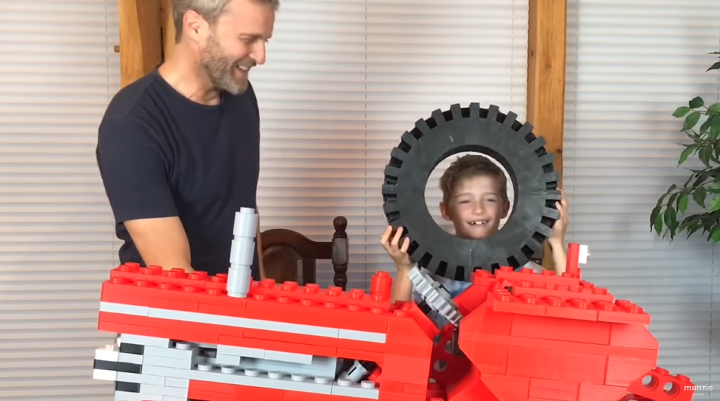  Child’s head for scale [Image via YouTube] 