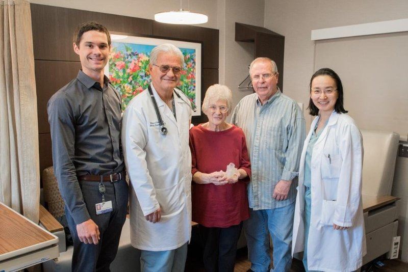 Myers, Dr. O’Neill, and Dr. Wang of the HFHS medical team with their 1,000th patient and her 3D printed heart [Image: HFHS] 
