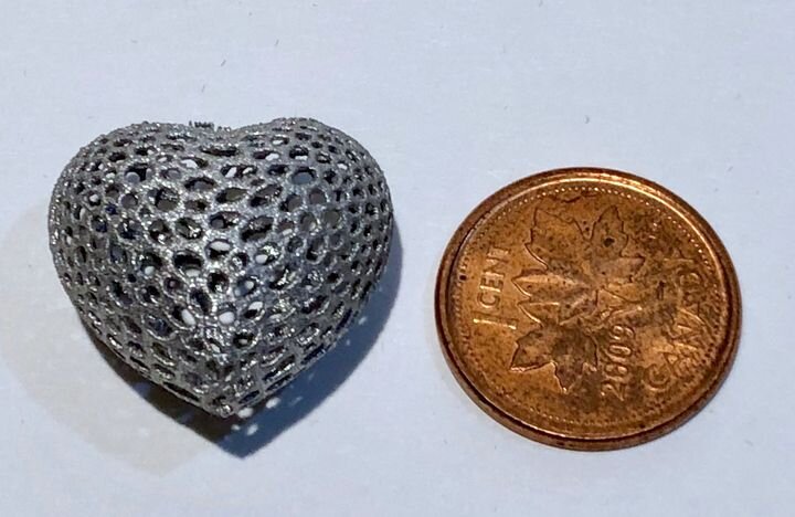  Additive Industries’ We Love Our Customers heart with penny for scale [Source: Fabbaloo] 