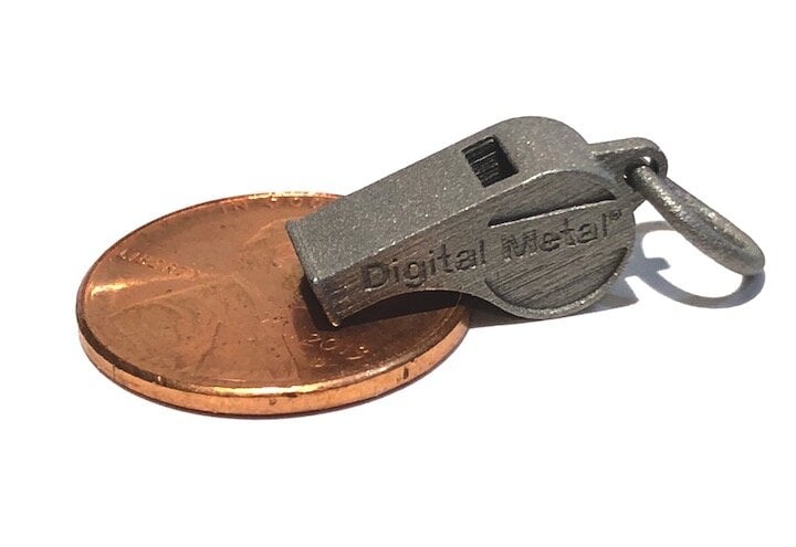 Comparison of a high resolution metal 3D print made by Digital Metal with a penny [Source: Fabbaloo]