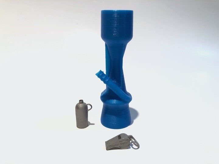 Comparison of a high-resolution metal 3D print made by Digital Metal with a plastic version of a ventilator valve [Source: Fabbaloo]