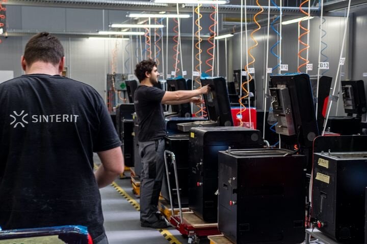 Technician working at Sinterit’s new massive factory [Source: Sinterit]