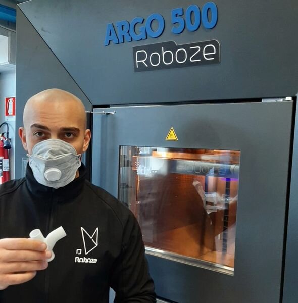 Roboze CEO Alessio Lorusso with 3D printed parts [Source: Roboze]