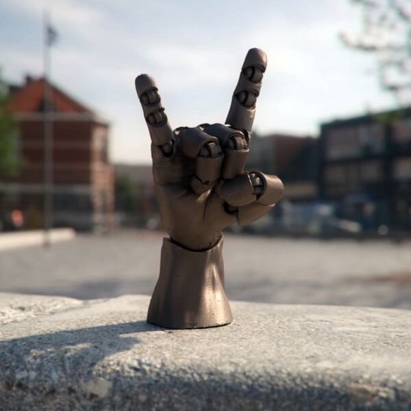  3D printed Articulated Poseable Hand signalling to us [Source: MyMiniFactory] 