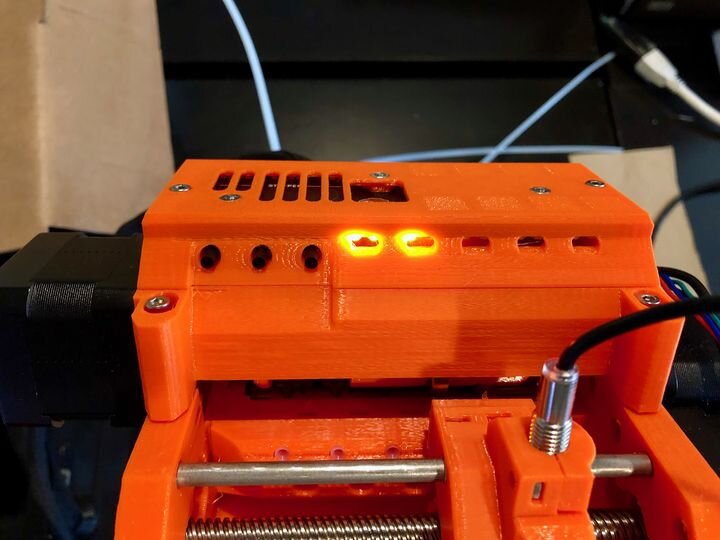  Three control buttons on the left of the Prusa MMU2S multi-material unit [Source: Fabbaloo] 