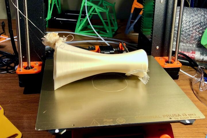  A tall, tipped over 3D print that didn’t stick properly [Source: Fabbaloo] 