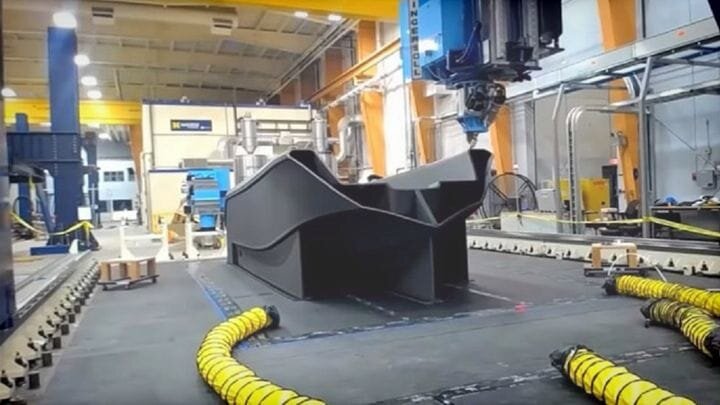  A full-size 3D printed boat being printed [Source: SolidSmack] 
