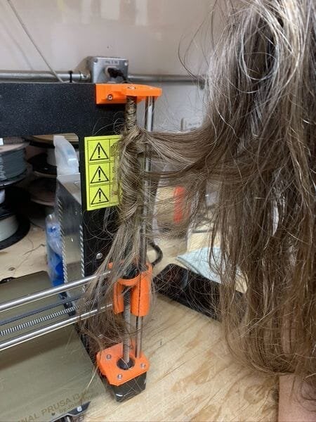 Long hair caught in an open-format 3D printer [Source: Fabbaloo] 
