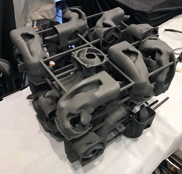  Example of a 3D print of a duct from an HP 3D printer, showing several parts created as one, all of them nested to get maximum parts in a build volume. [Source: ENGINEERING.com] 