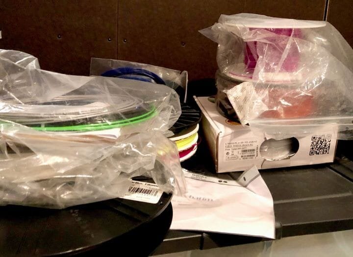  A pile of random 3D printer filaments, mostly stored in sealed bags [Source: Fabbaloo] 