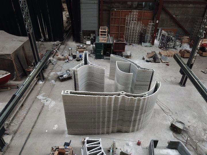  The COBOD BOD2 construction 3D printer at work on a large, complex wall section [Source:COBOD] 