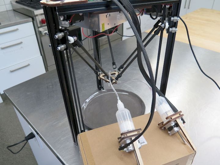  A delta 3D printer modified to use a coaxial nozzle [Source: 3D Digital Cooks] 