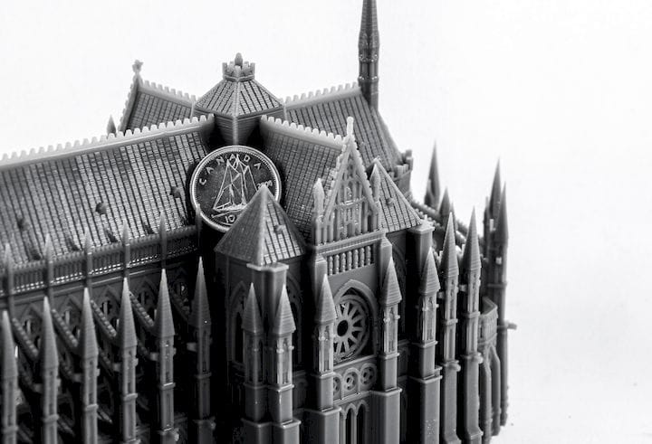  3D printed cathedral with dime for scale [Source: NewPro3D] 