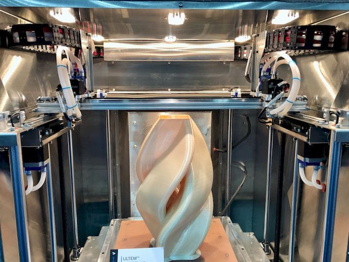  Inside the AON-M2 high-temp 3D printer with an ULTEM print on the bed [Source: Fabbaloo] 