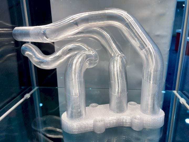  Part made with VSHAPER’s 5-axis 3D printer. Note non-parallel layer lines [Source: Fabbaloo] 