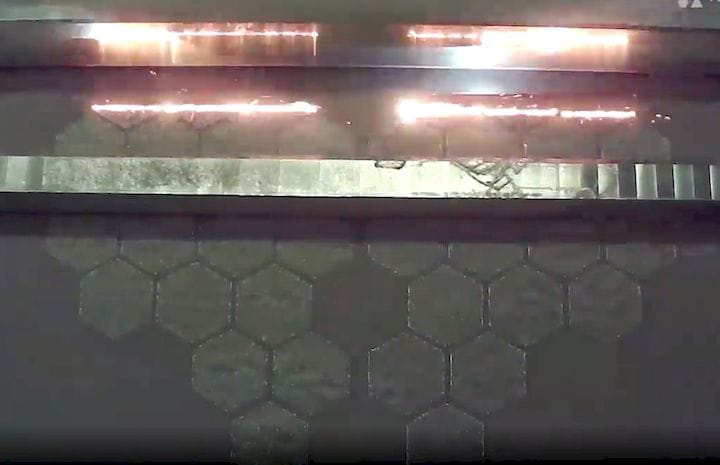  The MCP process involves firing sintering laser through a grating [Source: Aurora Labs] 