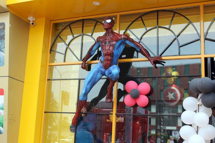  The 3D printed Spiderman sculpture mounted on a storefront [Source: STPL 3D Printing] 