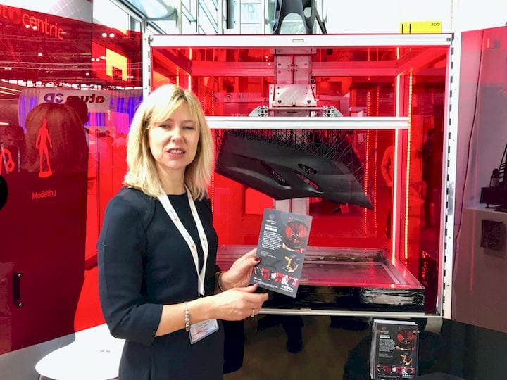  Photocentric’s Sally Tipping showing the true size of their new LC Maximus resin 3D printer [Source: Fabbaloo] 