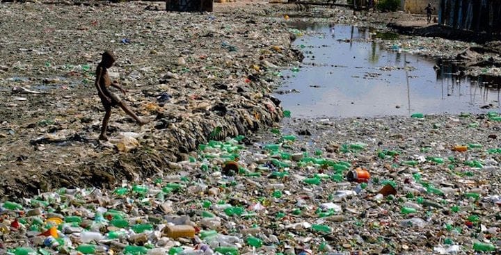  A waste dump in Haiti where recyclable plastic bottles may be obtained [Source: Clean Currents] 