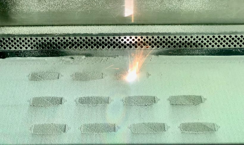  Metal 3D printing in action: note the “splash” of hot metal [Source: Fabbaloo] 