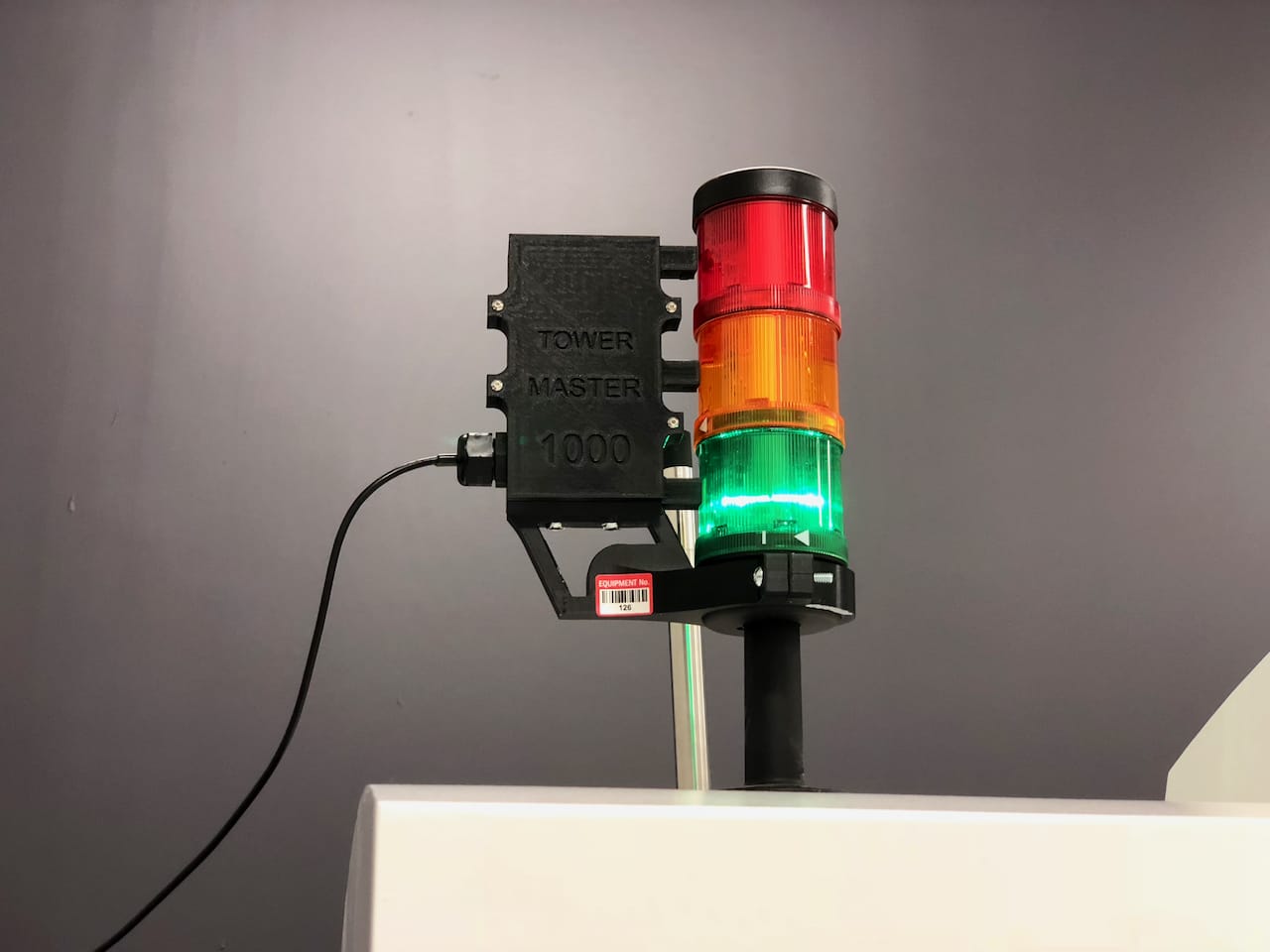  A homemade alert system installed on one of Precision ADM’s metal 3D printers [Source: Fabbaloo] 