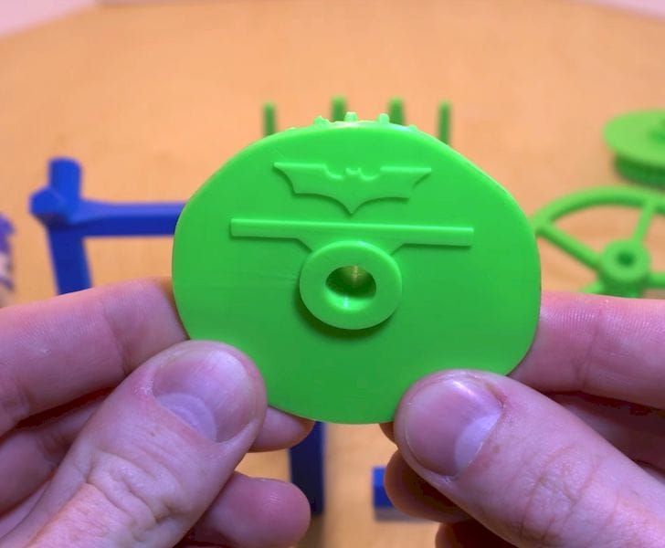  The laser pattern for a cam wheel is embossed on the 3D printed mechanical laser system 
