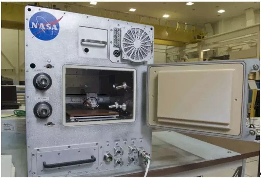  The mini fridge-sized Refabricator is capable of recycling and 3D printing with space-grade ULTEM plastic. (Image courtesy of NASA/MSFC/Emmett Given.) 