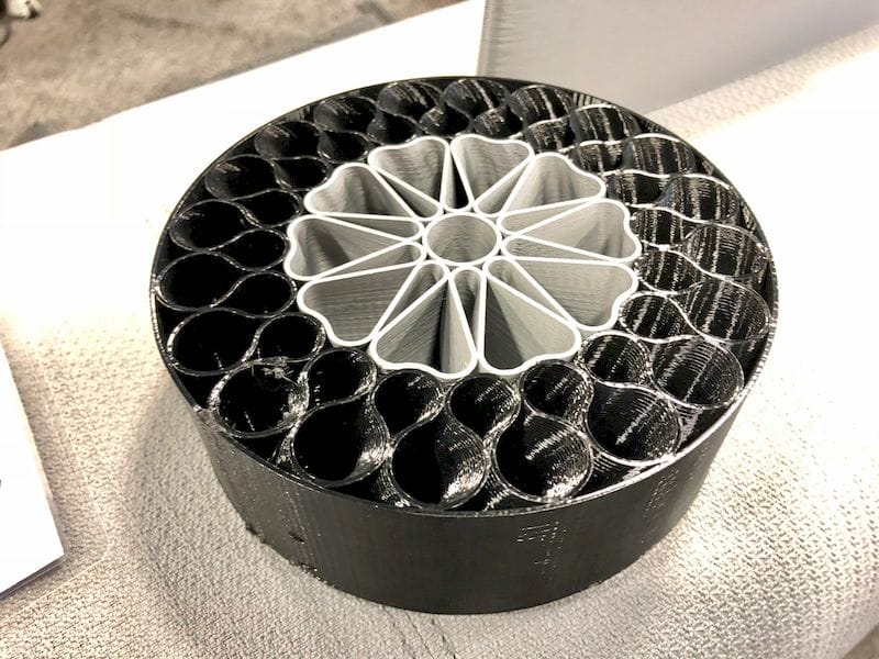  A 3D printed wheel and tire by BigRep. The black portion is flexible 