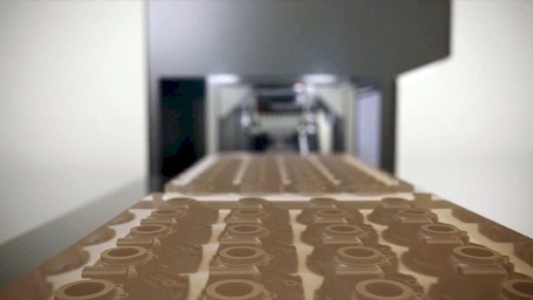  STEP 3D printing production involves a moving conveyor belt to deliver completed prints 