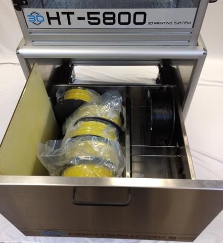  Storing materials in the HT 5800's cabinet bay 