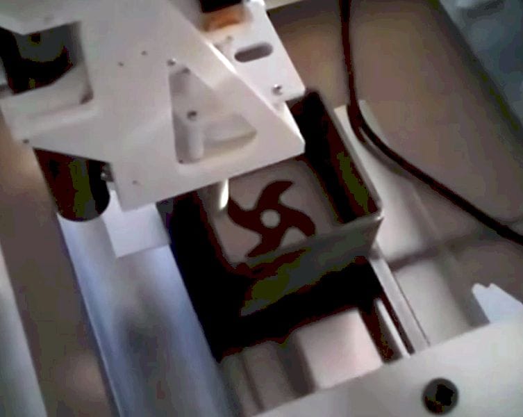  The Iro3D metal printer in action. Note visible sections of metal and support powders 