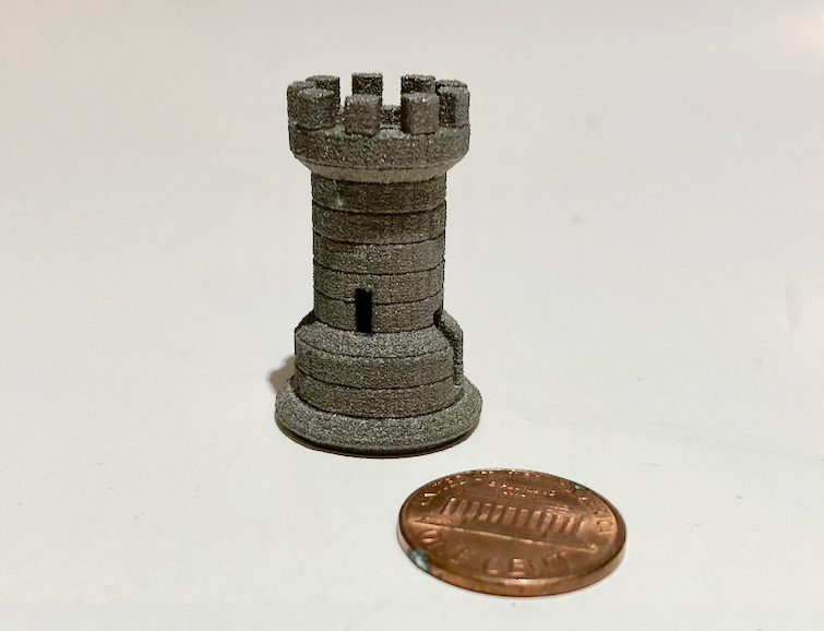 A sample 3D printed metal part made by Aurora Labs, showing considerable detail right out of the printer with no post processing.  