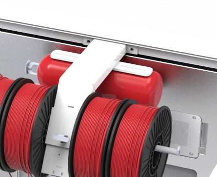  The 3DPrintClean's fire suppression system tucked in behind these 3D printer filament spools 