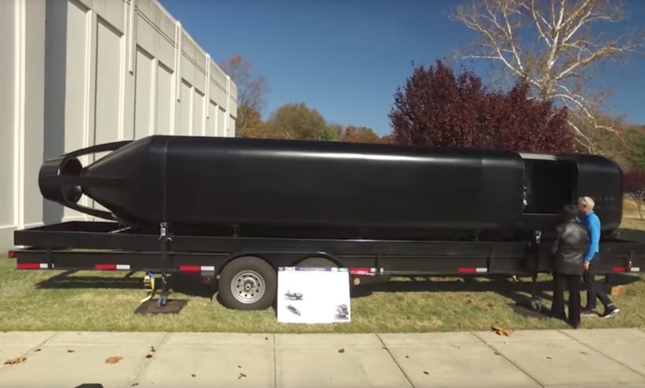  The 3D printed submarine hull from the US Navy, with some humans for scale 
