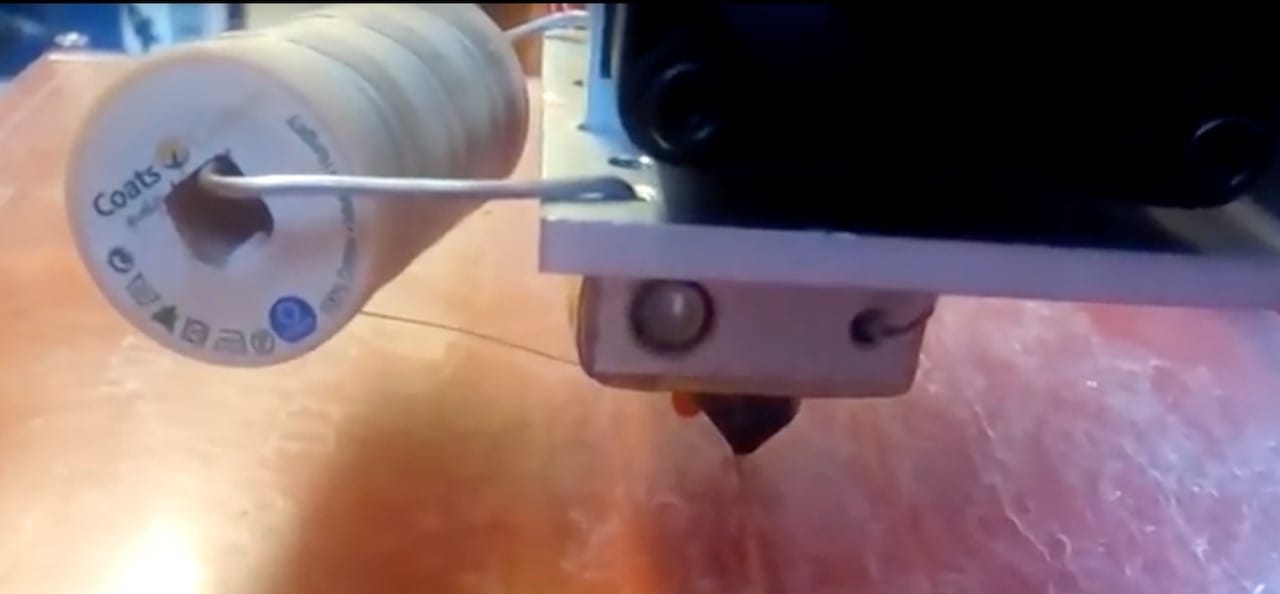  3D printing a composite material (with cotton thread) on a desktop 3D printer 