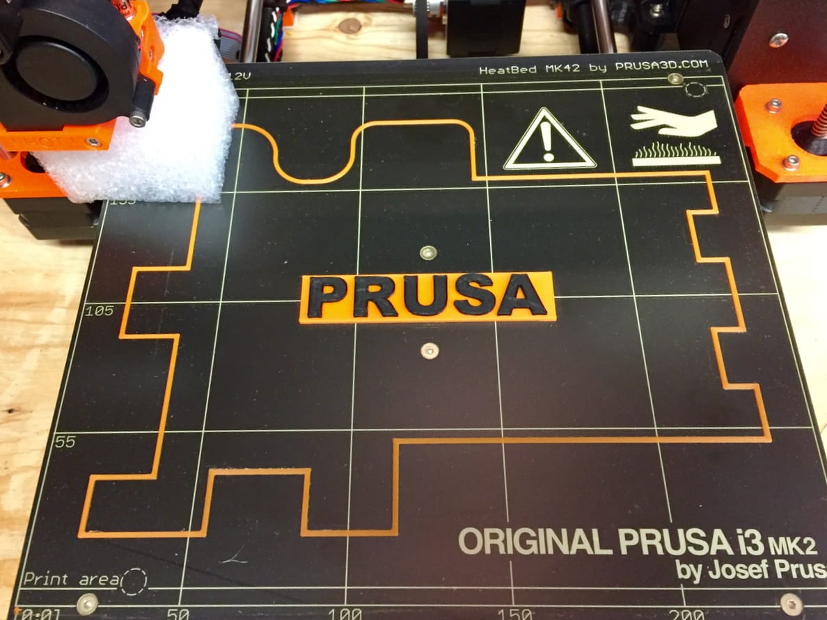  The factory print remains on the bed of the Original Pruse i3 desktop 3D printer 