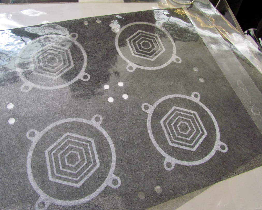  An in-progress composite sheet being used in the Impossible Objects 3D printer 