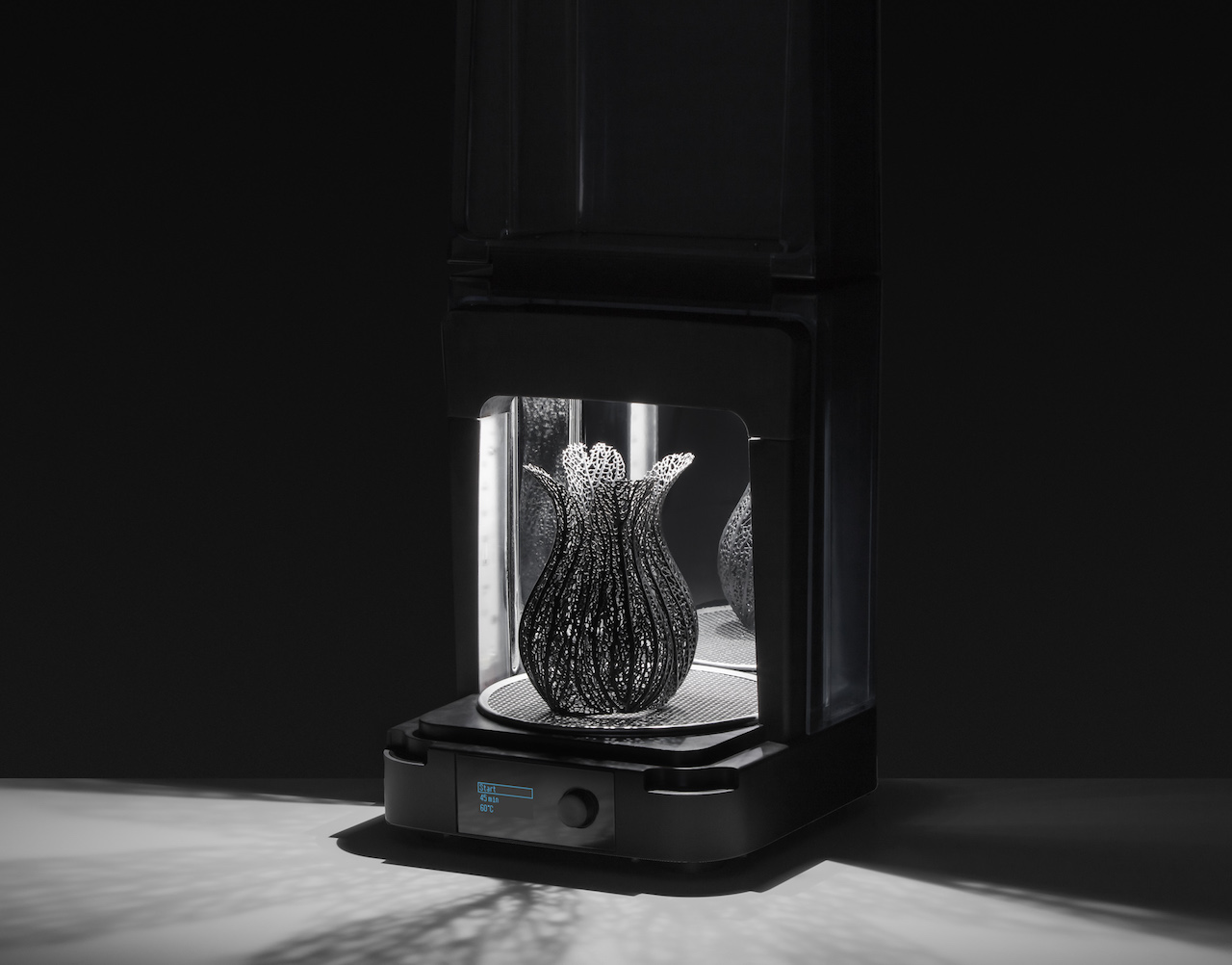  The new Formlabs Form Cure, shown curing a Nervous System 3D design 